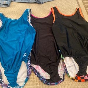 Plum gymnastics leotards